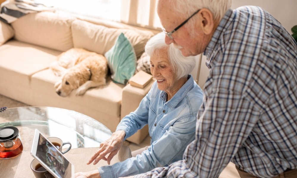 senior couple in a telehealth session.